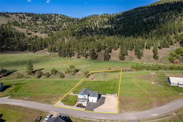 21087 Pamin Loop, Clinton, MT 59825 - view of rural area featuring property parcel outlined and a forest
