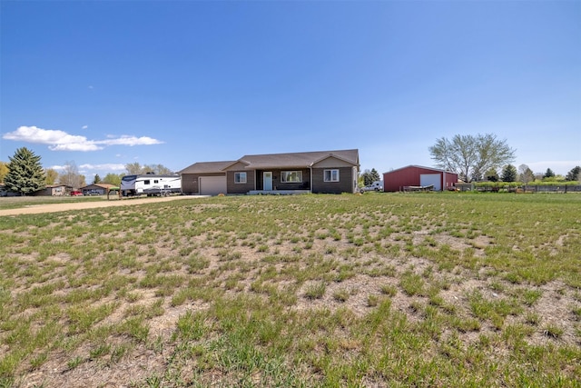 4175 Mchugh Ln, Helena, MT 59602 - single story home with a garage, driveway, and a front lawn