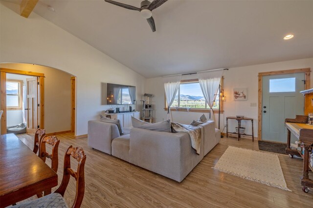 4175 Mchugh Ln, Helena, MT 59602 - living room featuring arched walkways, ceiling fan, light wood finished floors, recessed lighting, and baseboards