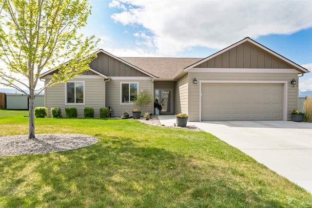 1317 Creekside Dr, Stevensville, MT 59870 - ranch-style home with board and batten siding, a garage, concrete driveway, a front yard, and a shingled roof