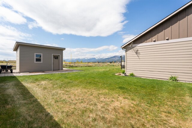 1317 Creekside Dr, Stevensville, MT 59870 - view of yard with a mountain view and an outdoor structure
