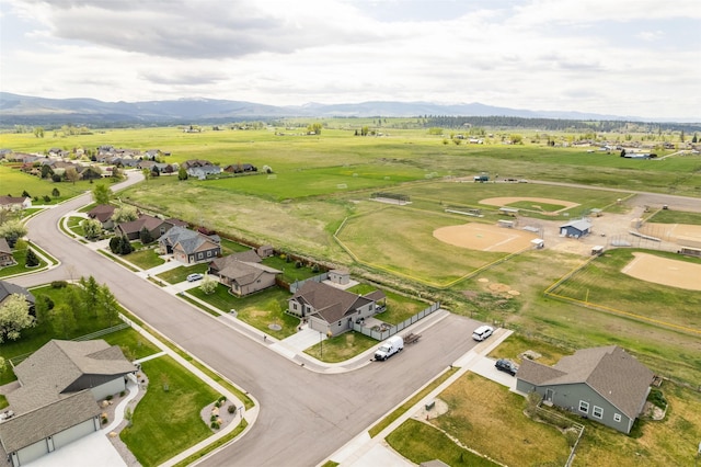 1317 Creekside Dr, Stevensville, MT 59870 - aerial view of property and surrounding area featuring a mountainous background and nearby suburban area