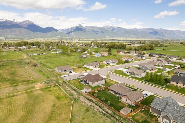 1317 Creekside Dr, Stevensville, MT 59870 - aerial overview of property's location featuring a mountain backdrop and nearby suburban area