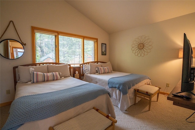 281 Eagle Bend Dr, Bigfork, MT 59911 - bedroom featuring vaulted ceiling and light colored carpet