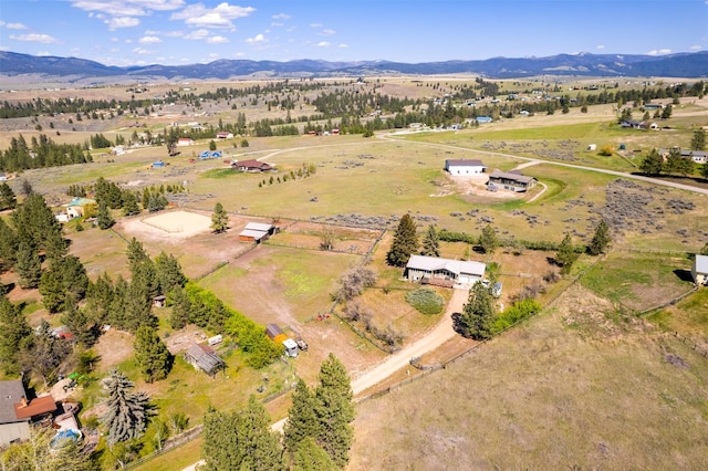 445 Sapphire Ln, Stevensville, MT 59870 - aerial overview of property's location with rural landscape and a mountain backdrop