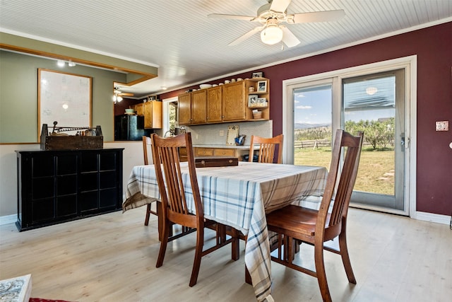 445 Sapphire Ln, Stevensville, MT 59870 - dining area with ornamental molding, a ceiling fan, and light wood-style floors