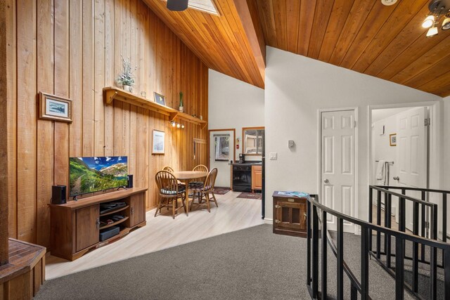 74 Limber Pne, Whitefish, MT 59937 - corridor featuring vaulted ceiling, wooden ceiling, wood walls, an upstairs landing, and wood finished floors