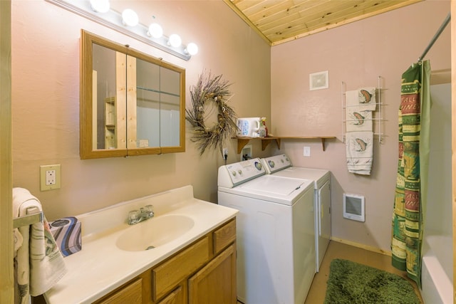 1500 River Rd W, Plains, MT 59859 - washroom with washing machine and clothes dryer and wood ceiling