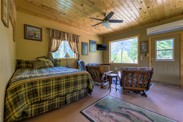 1500 River Rd W, Plains, MT 59859 - carpeted bedroom with wood ceiling, an AC wall unit, and a ceiling fan