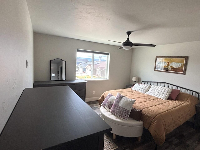 2195 Black Bird Ln, Kalispell, MT 59901 - bedroom with wood finished floors and ceiling fan