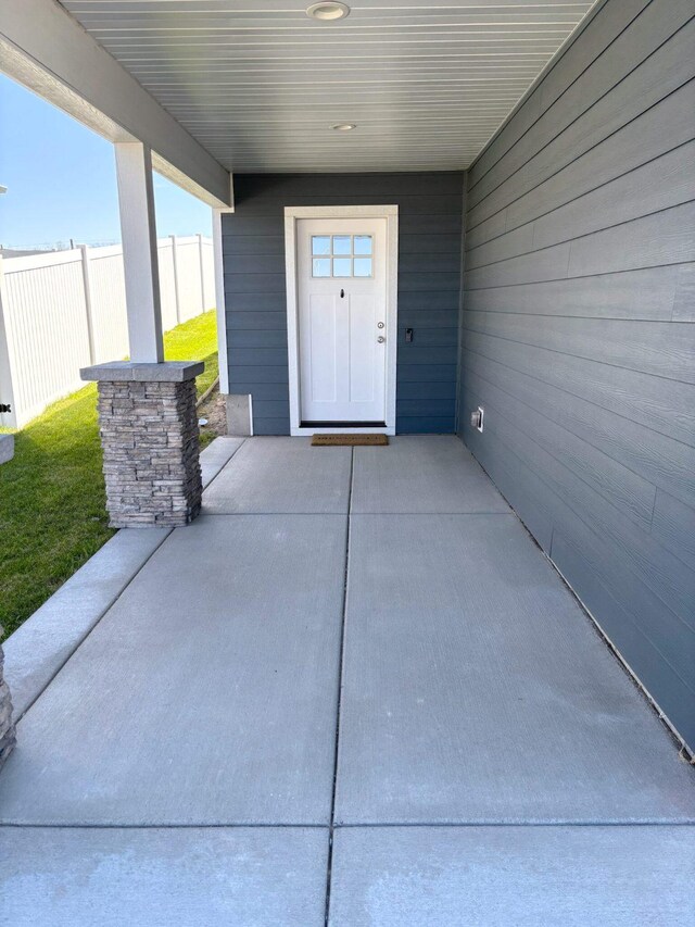 2195 Black Bird Ln, Kalispell, MT 59901 - property entrance featuring a patio area