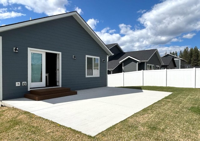 2195 Black Bird Ln, Kalispell, MT 59901 - back of house featuring a patio