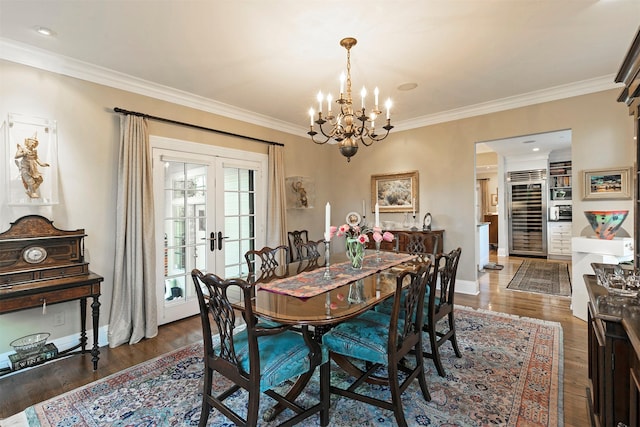 145 E Beckwith Ave, Missoula, MT 59801 - dining space featuring a chandelier, ornamental molding, wine cooler, french doors, and baseboards