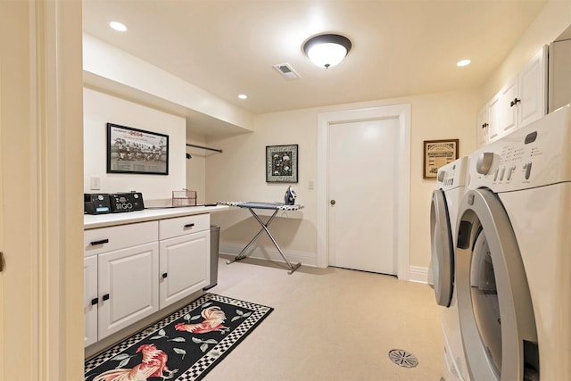 145 E Beckwith Ave, Missoula, MT 59801 - laundry area featuring washing machine and clothes dryer, cabinet space, light carpet, recessed lighting, and baseboards