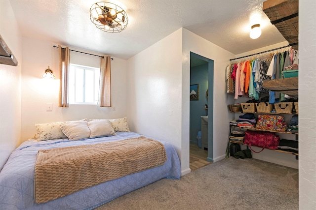 4358 Charlotte Way, Stevensville, MT 59870 - carpeted bedroom with connected bathroom