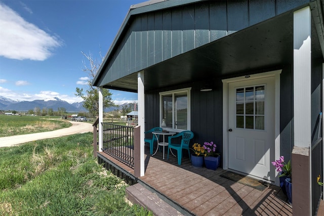 4358 Charlotte Way, Stevensville, MT 59870 - view of exterior entry with a mountain view and covered porch
