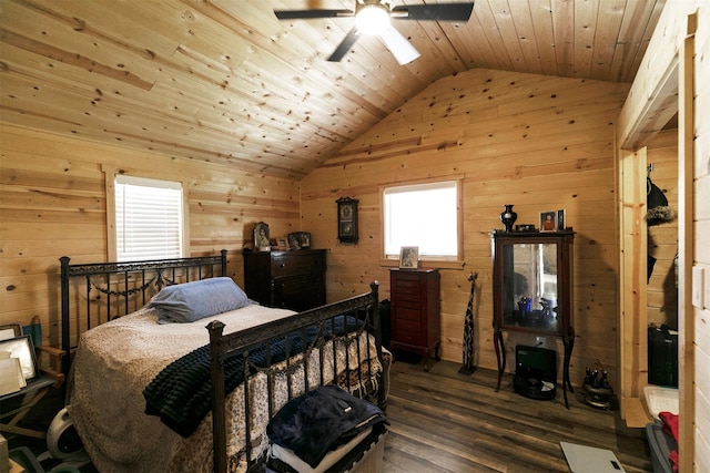 4358 Charlotte Way, Stevensville, MT 59870 - bedroom with vaulted ceiling, multiple windows, wood finished floors, wooden walls, and wooden ceiling