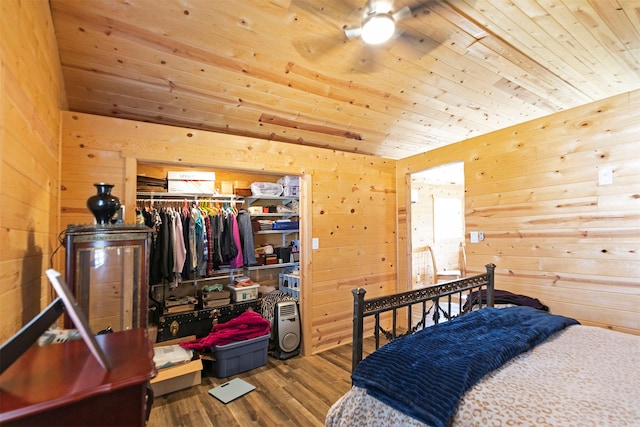 4358 Charlotte Way, Stevensville, MT 59870 - bedroom featuring wood ceiling, wooden walls, wood finished floors, and a closet