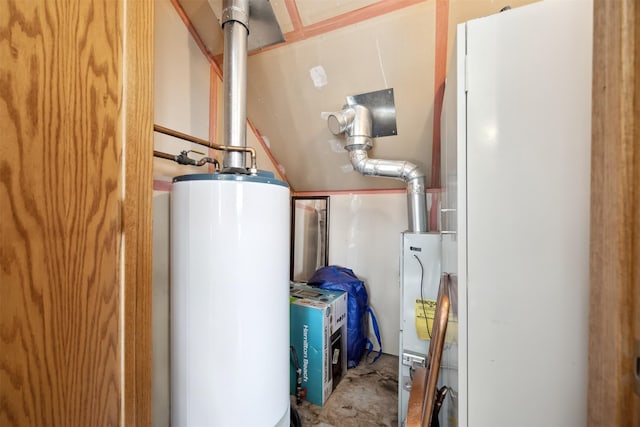utility room featuring gas water heater