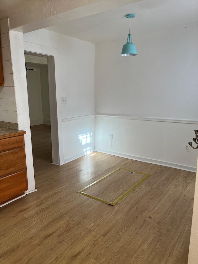 29 3rd Ave E, Kalispell, MT 59901 - unfurnished room with wood finished floors and baseboards