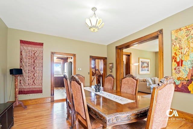 202 Blake St, Helena, MT 59601 - dining area with a chandelier and light wood-style floors