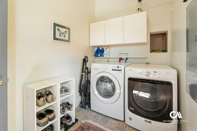 202 Blake St, Helena, MT 59601 - laundry area featuring cabinet space and separate washer and dryer