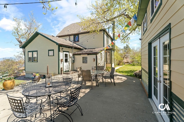 202 Blake St, Helena, MT 59601 - view of patio with outdoor dining space and french doors