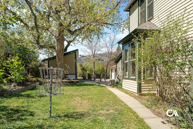 202 Blake St, Helena, MT 59601 - view of grassy yard with a patio