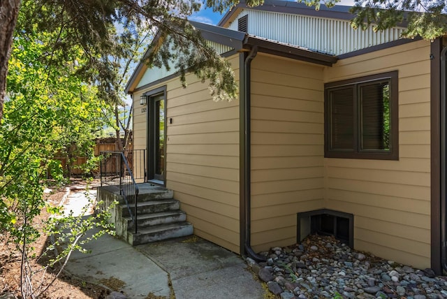 view of property exterior with fence