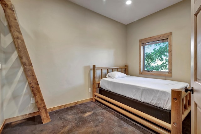 bedroom with baseboards and recessed lighting