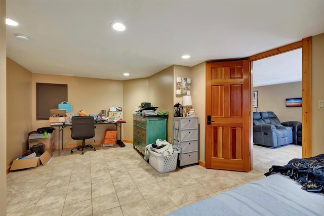 bedroom with an office area, recessed lighting, and baseboards