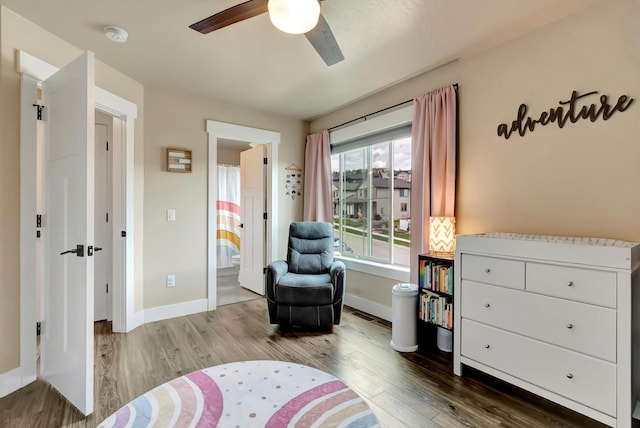 7047 Shaver Dr Unit B, Missoula, MT 59803 - sitting room with wood finished floors, ceiling fan, and baseboards