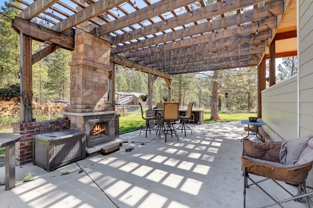 11327 Sleeman Ln, Lolo, MT 59847 - view of patio with an outdoor stone fireplace and outdoor dining area