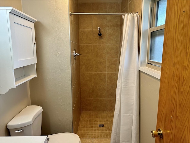 146 New Meadows Dr, Missoula, MT 59808 - full bathroom featuring tiled shower and a textured wall