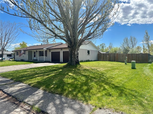 146 New Meadows Dr, Missoula, MT 59808 - ranch-style home with an attached garage and driveway