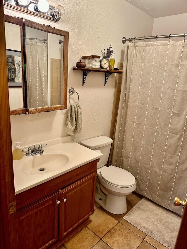 146 New Meadows Dr, Missoula, MT 59808 - bathroom with tile patterned floors, vanity, and a shower with shower curtain