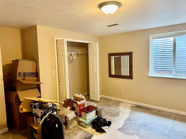 146 New Meadows Dr, Missoula, MT 59808 - bedroom with a closet and a textured ceiling