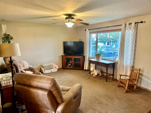 146 New Meadows Dr, Missoula, MT 59808 - carpeted living room with a ceiling fan and a textured ceiling
