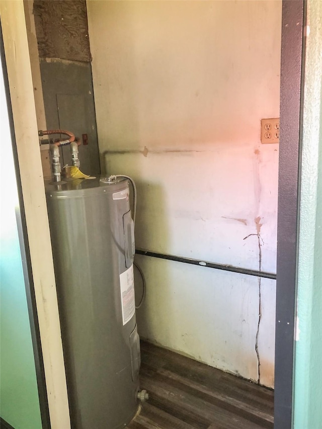 613 Minnesota Ave, Libby, MT 59923 - utility room featuring water heater
