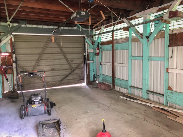 613 Minnesota Ave, Libby, MT 59923 - garage featuring a garage door opener