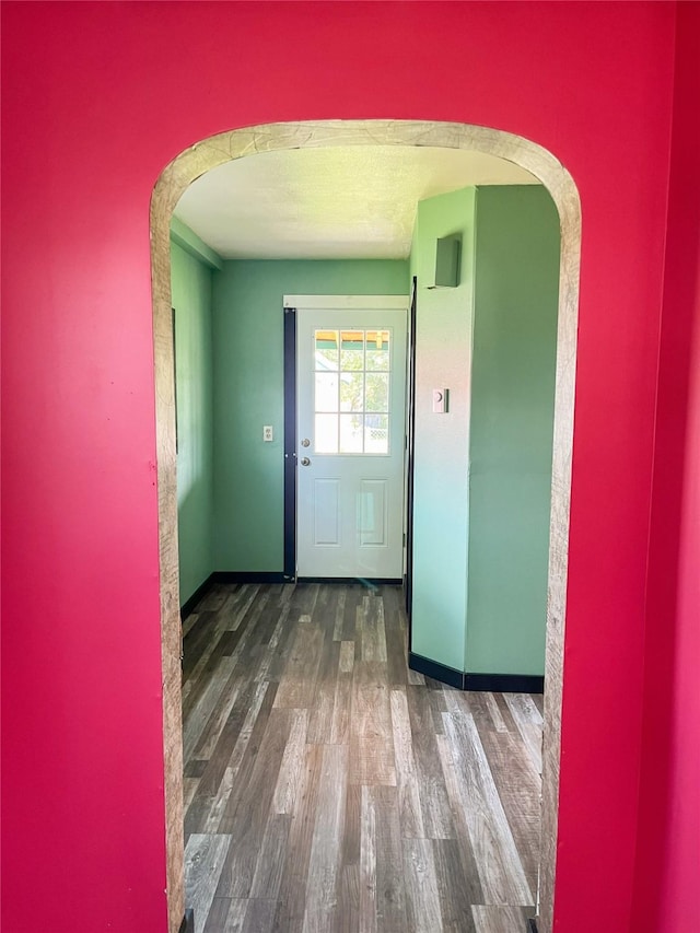 613 Minnesota Ave, Libby, MT 59923 - entryway with arched walkways and wood finished floors