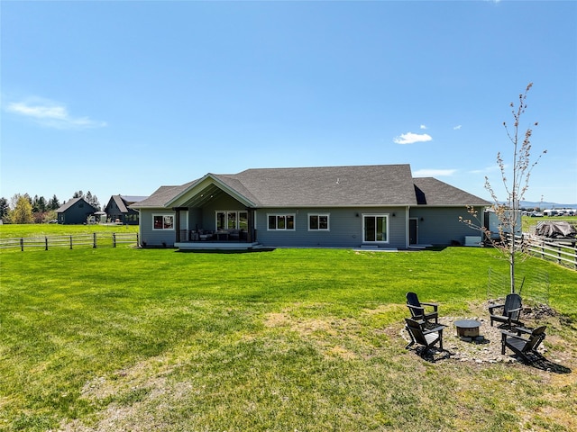 29 Elk Run Trl, Kalispell, MT 59901 - back of house with an outdoor fire pit