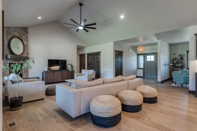 29 Elk Run Trl, Kalispell, MT 59901 - living area with a ceiling fan, wood finished floors, and high vaulted ceiling