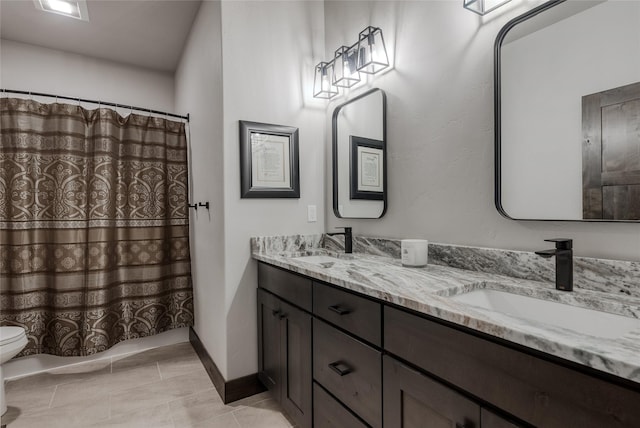 29 Elk Run Trl, Kalispell, MT 59901 - full bathroom with double vanity, a shower with curtain, and tile patterned flooring