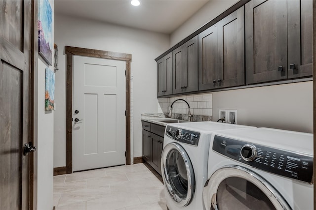 29 Elk Run Trl, Kalispell, MT 59901 - laundry room with washer and clothes dryer, cabinet space, and recessed lighting