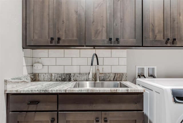 29 Elk Run Trl, Kalispell, MT 59901 - laundry area featuring cabinet space and hookup for a washing machine