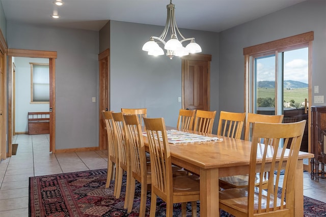 36496 Ridgeway Ct, Polson, MT 59860 - dining space with a chandelier, light tile patterned floors, and baseboards