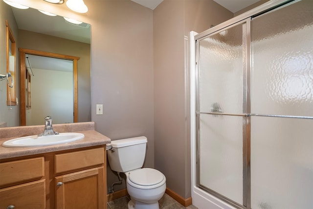 36496 Ridgeway Ct, Polson, MT 59860 - full bathroom with vanity, a shower stall, toilet, and tile patterned flooring