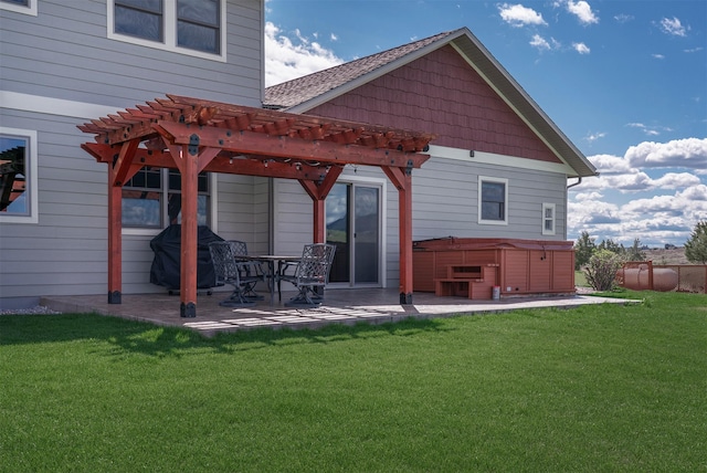 36496 Ridgeway Ct, Polson, MT 59860 - back of property featuring a hot tub, a pergola, and a patio area