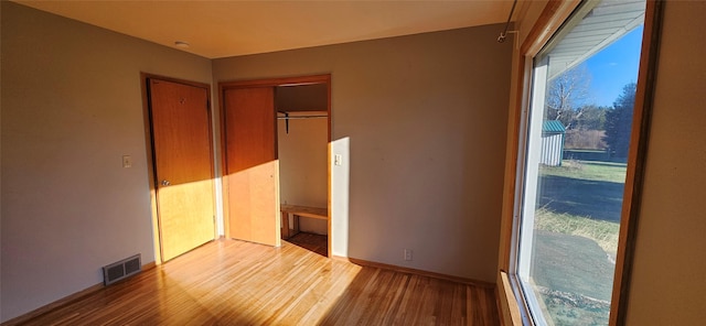 350 1st Ave N, Lincoln, MT 59639 - unfurnished bedroom with wood finished floors and a closet